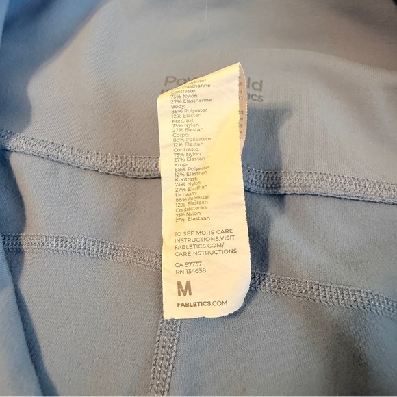 Fabletics | Blue Leggings with Signature Reflective White Side Stripe - Picture 8 of 9